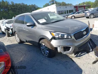 2018 Kia Sorento LX z VIN 5XYPG4A37JG407383, wystawiony jako IAAI lot #42038017 z przebiegiem 62 936 mil mil oraz . Historia ofert i sprzedaży dostępna na DreamBid. Obrazek 1.