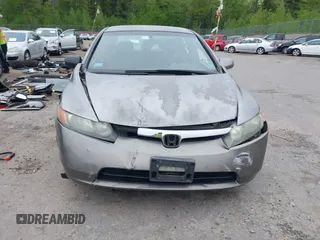 2006 Honda Civic LX z VIN 2HGFA165X6H525119, wystawiony jako IAAI lot #42314196 z przebiegiem 121 752 mil mil oraz . Historia ofert i sprzedaży dostępna na DreamBid. Obrazek 13.