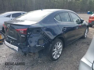 2015 Mazda 3 S Grand Touring with VIN JM1BM1W37F1255297, listed as a IAAI auction lot 41836467 with 145,361 mi miles and . Bid and sale history available at DreamBid. Image 4.