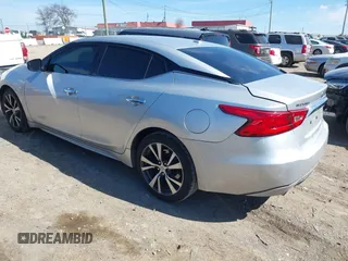 2016 Nissan Maxima Platinum with VIN 1N4AA6AP1GC400986, listed as a IAAI auction lot 41603612 with 171,784 mi miles and . Bid and sale history available at DreamBid. Image 3.