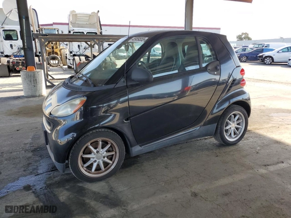 2008 Smart fortwo Pure with VIN WMEEJ31X78K129323, listed as a Copart auction lot 48989555 with NaN miles and Clean Title. Bid and sale history available at carsss.com. Image 1.