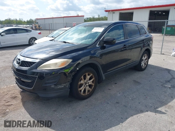 2012 Mazda CX-9 Touring with VIN JM3TB2CA7C0351670, listed as a IAAI auction lot 42148313 with 248,799 mi miles and . Bid and sale history available at DreamBid. Image 2.