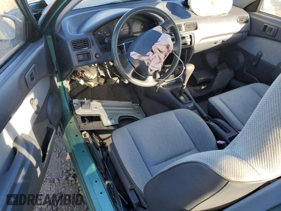 1996 Toyota Tercel DX z VIN JT2AC52L6T0170537, wystawiony jako Copart lot #42576525 z przebiegiem 66 926 mil mil oraz Szkoda całkowita • Salvage title. Historia ofert i sprzedaży dostępna na DreamBid. Obrazek 8.