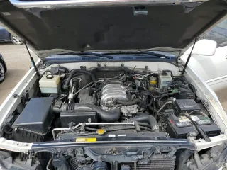 2002 Lexus LX 470 z VIN JTJHT00W423522126, wystawiony jako Copart lot #56582855 z przebiegiem 280 679 mil mil oraz Szkoda całkowita • Salvage title. Historia ofert i sprzedaży dostępna na DreamBid. Obrazek 12.