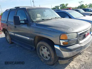 2001 GMC Yukon SLT with VIN 1GKEK13T81J177892, listed as a IAAI auction lot 41924669 with 198,561 mi miles. Bid and sale history available at carsss.com. Image 1.