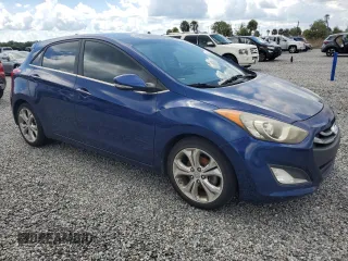 2013 Hyundai Elantra GT with VIN KMHD35LE3DU106191, listed as a Copart auction lot 74074794 with 0 mi miles and Salvage Title. Bid and sale history available at carsss.com. Image 4.