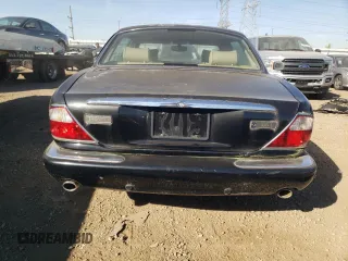 2001 Jaguar XJ with VIN SAJDA23C31LF28667, listed as a Copart auction lot 76983144 with 87,542 mi miles and Clean title. Bid and sale history available at DreamBid. Image 6.
