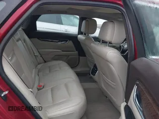 2013 Cadillac XTS Luxury with VIN 2G61P5S32D9115640, listed as a IAAI auction lot 41065284 with 125,643 mi miles and . Bid and sale history available at carsss.com. Image 8.