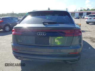 2021 Audi Q8 Premium Plus z VIN WA1EVAF15MD035056, wystawiony jako IAAI lot #41534412 z przebiegiem 65 579 mil mil oraz . Historia ofert i sprzedaży dostępna na DreamBid. Obrazek 17.