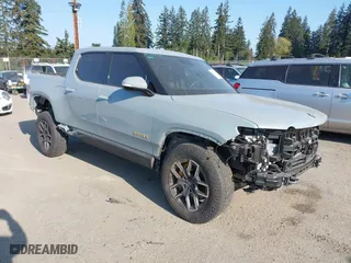 2022 Rivian R1T Adventure Package with VIN 7FCTGAAA5NN007018, listed as a IAAI auction lot 42018939 with 41,991 mi miles. Bid and sale history available at carsss.com. Image 1.