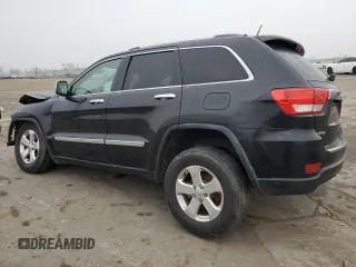 2013 Jeep Grand Cherokee Limited with VIN 1C4RJEBG5DC657005, listed as a Copart auction lot 84101024 with 124,055 mi miles and Salvage Title. Bid and sale history available at carsss.com. Image 2.