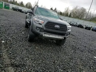 2018 Toyota Tacoma SR with VIN 3TMCZ5AN5JM132681, listed as a Copart auction lot 43244765 with 99,881 mi miles and Salvage Title. Bid and sale history available at carsss.com. Image 10.