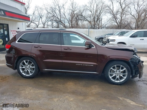 2015 Jeep Grand Cherokee Summit with VIN 1C4RJFJT7FC840560, listed as a IAAI auction lot 41596868 with 173,392 mi miles. Bid and sale history available at carsss.com. Image 13.