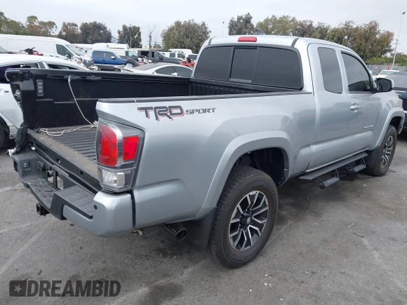 2022 Toyota Tacoma SR with VIN 3TYRZ5CN9NT022492, listed as a IAAI auction lot 42378801 with 9,312 mi miles and . Bid and sale history available at DreamBid. Image 4.