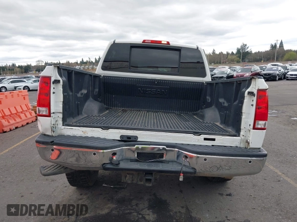 2013 Nissan Titan PRO-4X with VIN 1N6BA0EC9DN301669, listed as a IAAI auction lot 41868397 with 171,085 mi miles. Bid and sale history available at carsss.com. Image 16.