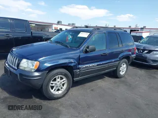 2004 Jeep Grand Cherokee with VIN 1J4GX48J74C283123, listed as a IAAI auction lot 42477393 with 182,491 mi miles and . Bid and sale history available at DreamBid. Image 6.