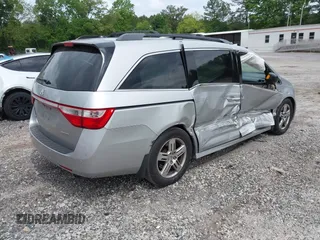 2012 Honda Odyssey Touring с VIN 5FNRL5H90CB083157, выставлен на аукционе IAAI как лот 42176609 с пробегом 250 000 миль миль и . История ставок и продаж доступна на DreamBid. Изображение 4.