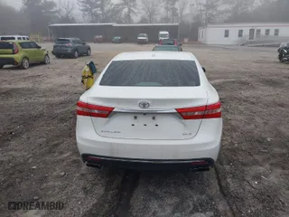 2016 Toyota Avalon Limited with VIN 4T1BK1EB8GU234565, listed as a IAAI auction lot 41804701 with 128,700 mi miles. Bid and sale history available at carsss.com. Image 16.