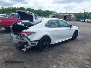 2023 Toyota Camry TRD z VIN 4T1KZ1AK8PU073362, wystawiony jako IAAI lot #42244183 z przebiegiem 103 245 mil mil oraz . Historia ofert i sprzedaży dostępna na DreamBid. Obrazek 4.
