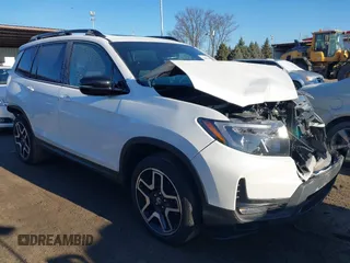 2023 Honda Passport Elite with VIN 5FNYF8H05PB005081, listed as a IAAI auction lot 41698186 with 31,853 mi miles and . Bid and sale history available at DreamBid. Image 1.