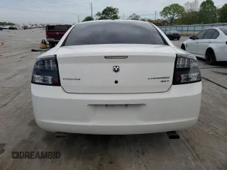 2009 Dodge Charger SXT with VIN 2B3KA33V79H576287, listed as a Copart auction lot 53797755 with 184,584 mi miles and Salvage Title. Bid and sale history available at carsss.com. Image 6.