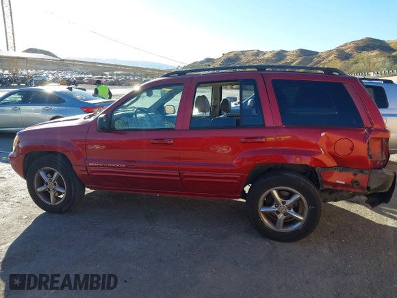 2002 Jeep Grand Cherokee Limited with VIN 1J8GX58N92C186560, listed as a IAAI auction lot 41383003 with 206,195 mi miles and . Bid and sale history available at DreamBid. Image 14.