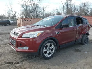 2016 Ford Escape SE with VIN 1FMCU0G75GUB22209, listed as a IAAI auction lot 41864084 with 96,313 mi miles. Bid and sale history available at carsss.com. Image 2.