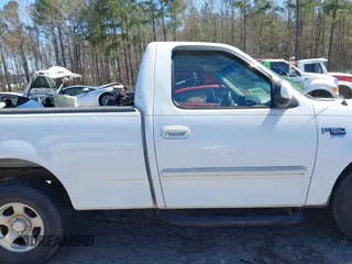 2001 Ford F-150 XL z VIN 1FTRF17W61NB22632, wystawiony jako IAAI lot #41824156 z przebiegiem Nie podano mil oraz . Historia ofert i sprzedaży dostępna na DreamBid. Obrazek 13.