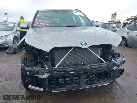 2023 BMW X1 xDrive28i z VIN WBX73EF02P5X48940, wystawiony jako IAAI lot #41528706 z przebiegiem 10 683 mil mil oraz . Historia ofert i sprzedaży dostępna na DreamBid. Obrazek 12.