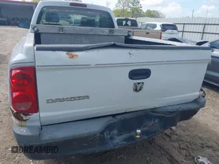 2008 Dodge Dakota ST with VIN 1D7HE22K38S522349, listed as a IAAI auction lot 41861319 with 104,309 mi miles and . Bid and sale history available at carsss.com. Image 6.