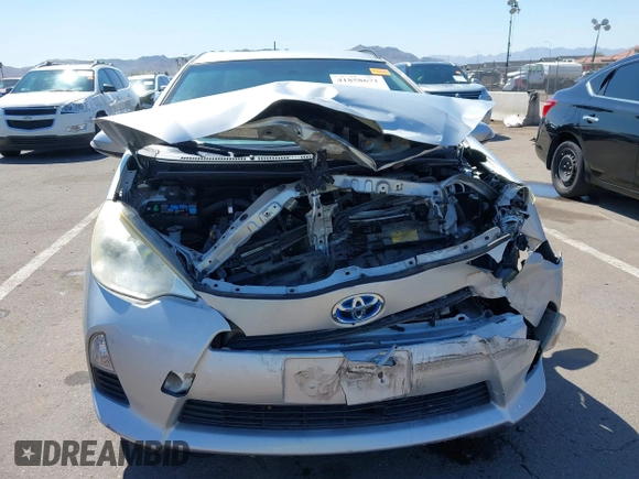 2012 Toyota Prius One with VIN JTDKDTB34C1023043, listed as a IAAI auction lot 41858671 with 91,497 mi miles and . Bid and sale history available at DreamBid. Image 12.