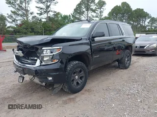2016 Chevrolet Tahoe LT z VIN 1GNSKBKC6GR210329, wystawiony jako IAAI lot #42126175 z przebiegiem 190 207 mil mil oraz . Historia ofert i sprzedaży dostępna na DreamBid. Obrazek 2.