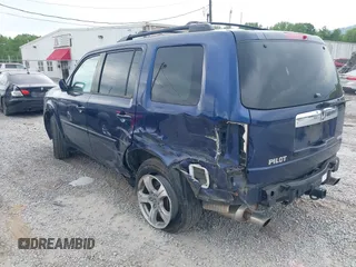 2015 Honda Pilot EX-L with VIN 5FNYF4H56FB040909, listed as a IAAI auction lot 42028609 with 267,375 mi miles and . Bid and sale history available at carsss.com. Image 3.