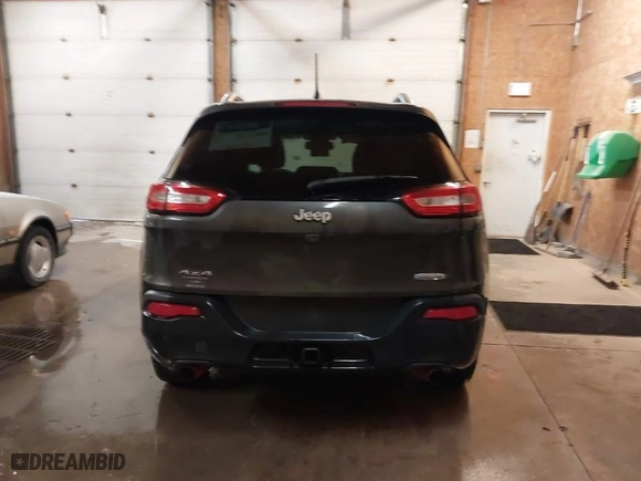 2014 Jeep Cherokee Latitude with VIN 1C4PJMCS7EW220059, listed as a IAAI auction lot 41312941 with 187,821 mi miles. Bid and sale history available at carsss.com. Image 16.