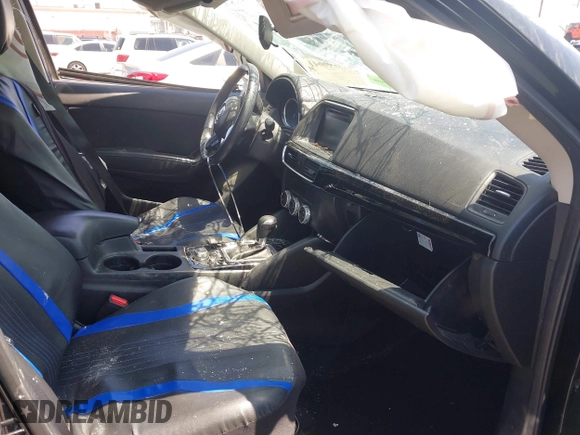 2016 Mazda CX-5 Sport with VIN JM3KE2BY4G0807776, listed as a IAAI auction lot 42206641 with 136,809 mi miles and . Bid and sale history available at DreamBid. Image 5.