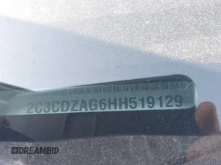 2017 Dodge Challenger SXT z VIN 2C3CDZAG6HH519129, wystawiony jako IAAI lot #41771993 z przebiegiem 56 676 mil mil oraz . Historia ofert i sprzedaży dostępna na DreamBid. Obrazek 9.