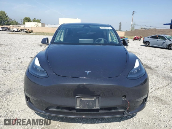 2024 Tesla Model Y Long Range z VIN 7SAYGDEE3RF121102, wystawiony jako Copart lot #60548895 z przebiegiem 13 336 mil mil oraz Szkoda całkowita • Salvage title. Historia ofert i sprzedaży dostępna na DreamBid. Obrazek 5.