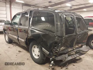 2000 GMC Yukon SLT with VIN 1GKEK13T1YJ176643, listed as a IAAI auction lot 41729346 with 265,124 mi miles. Bid and sale history available at carsss.com. Image 3.