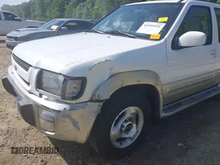 1998 Infiniti QX4 z VIN JNRAR05Y9WW020956, wystawiony jako IAAI lot #42169231 z przebiegiem 99 999 mil mil oraz . Historia ofert i sprzedaży dostępna na DreamBid. Obrazek 6.