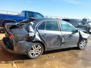 2007 Volkswagen Jetta 2.5 z VIN 3VWRF71K37M101410, wystawiony jako IAAI lot #41863276 z przebiegiem 195 616 mil mil oraz . Historia ofert i sprzedaży dostępna na DreamBid. Obrazek 13.
