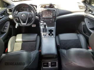 2017 Nissan Maxima SL с VIN 1N4AA6AP8HC399126, выставлен на аукционе Copart как лот 55857665 с пробегом 151 984 миль миль и Списание • Salvage title. История ставок и продаж доступна на DreamBid. Изображение 8.