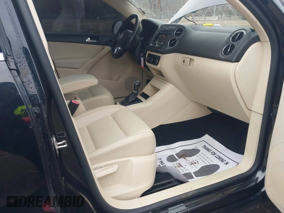 2012 Volkswagen Tiguan SE with VIN WVGAV7AX0CW602713, listed as a IAAI auction lot 41558520 with 95,678 mi miles and . Bid and sale history available at DreamBid. Image 5.