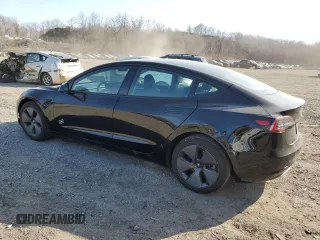 2023 Tesla Model 3 with VIN 5YJ3E1EA3PF670787, listed as a Copart auction lot 49070865 with 13,489 mi miles and Salvage title. Bid and sale history available at DreamBid. Image 2.
