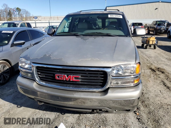 2001 GMC Yukon SLT z VIN 1GKEC13T71J223368, wystawiony jako Copart lot #86610954 z przebiegiem 414 811 mil mil oraz Szkoda całkowita • Salvage title. Historia ofert i sprzedaży dostępna na DreamBid. Obrazek 5.