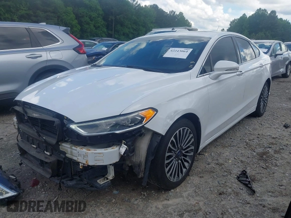 2017 Ford Fusion Titanium z VIN 3FA6P0K93HR203063, wystawiony jako IAAI lot #42243064 z przebiegiem 176 078 mil mil oraz . Historia ofert i sprzedaży dostępna na DreamBid. Obrazek 19.
