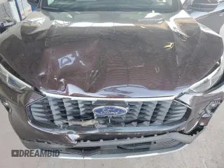 2023 Ford Escape с VIN 1FMCU0JZ4PUA29238, выставлен на аукционе Copart как лот 69858734 с пробегом 15 298 миль миль и Списание • Salvage title. История ставок и продаж доступна на DreamBid. Изображение 11.