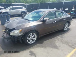 2014 Nissan Maxima S with VIN 1N4AA5AP9EC430843, listed as a IAAI auction lot 42104446 with 159,256 mi miles and . Bid and sale history available at DreamBid. Image 2.
