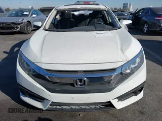 2017 Honda Civic EX-T with VIN 19XFC1E38HE002205, listed as a IAAI auction lot 40891678 with 10,398 mi miles and . Bid and sale history available at DreamBid. Image 12.