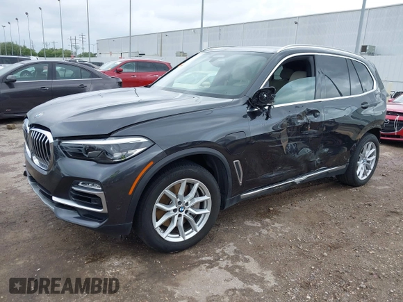 2021 BMW X5 xDrive45e with VIN 5UXTA6C02M9F88978, listed as a IAAI auction lot 42201563 with 23,339 mi miles and . Bid and sale history available at DreamBid. Image 20.