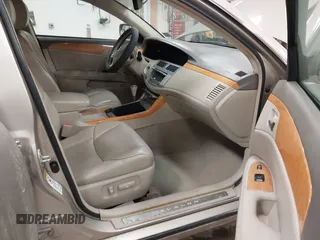 2007 Toyota Avalon XL z VIN 4T1BK36B17U232618, wystawiony jako IAAI lot #41633305 z przebiegiem 171 971 mil mil oraz . Historia ofert i sprzedaży dostępna na DreamBid. Obrazek 5.